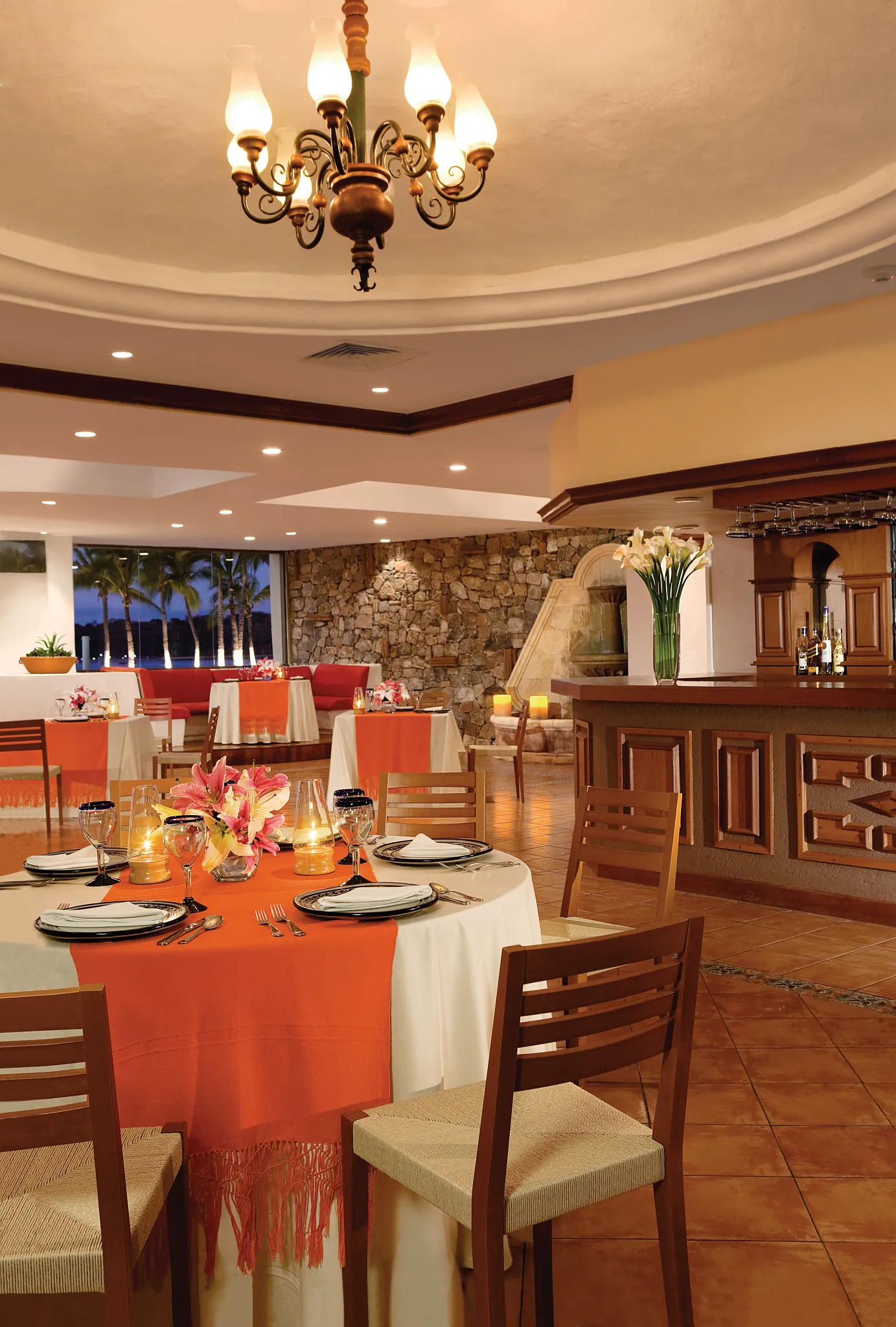 El Patio restaurant at Dreams Huatulco Resort & Spa featuring elegant indoor dining, traditional Mexican décor, and a warm, inviting ambiance.