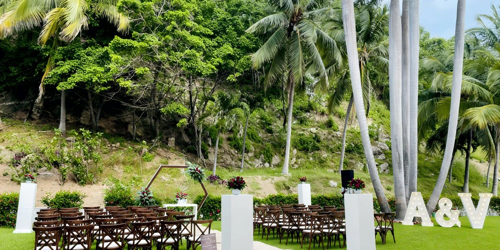 Garden gazebo wedding ceremony setup surrounded by tropical palms at Dreams Huatulco Resort & Spa