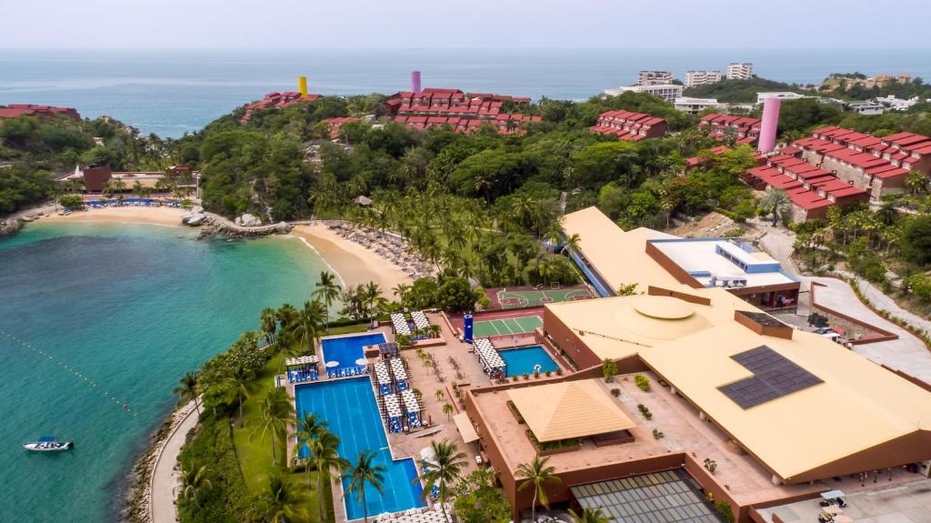 Las Brisas Huatulco resort with hillside casitas, private beach access, and stunning Pacific Ocean views in Oaxaca, Mexico.