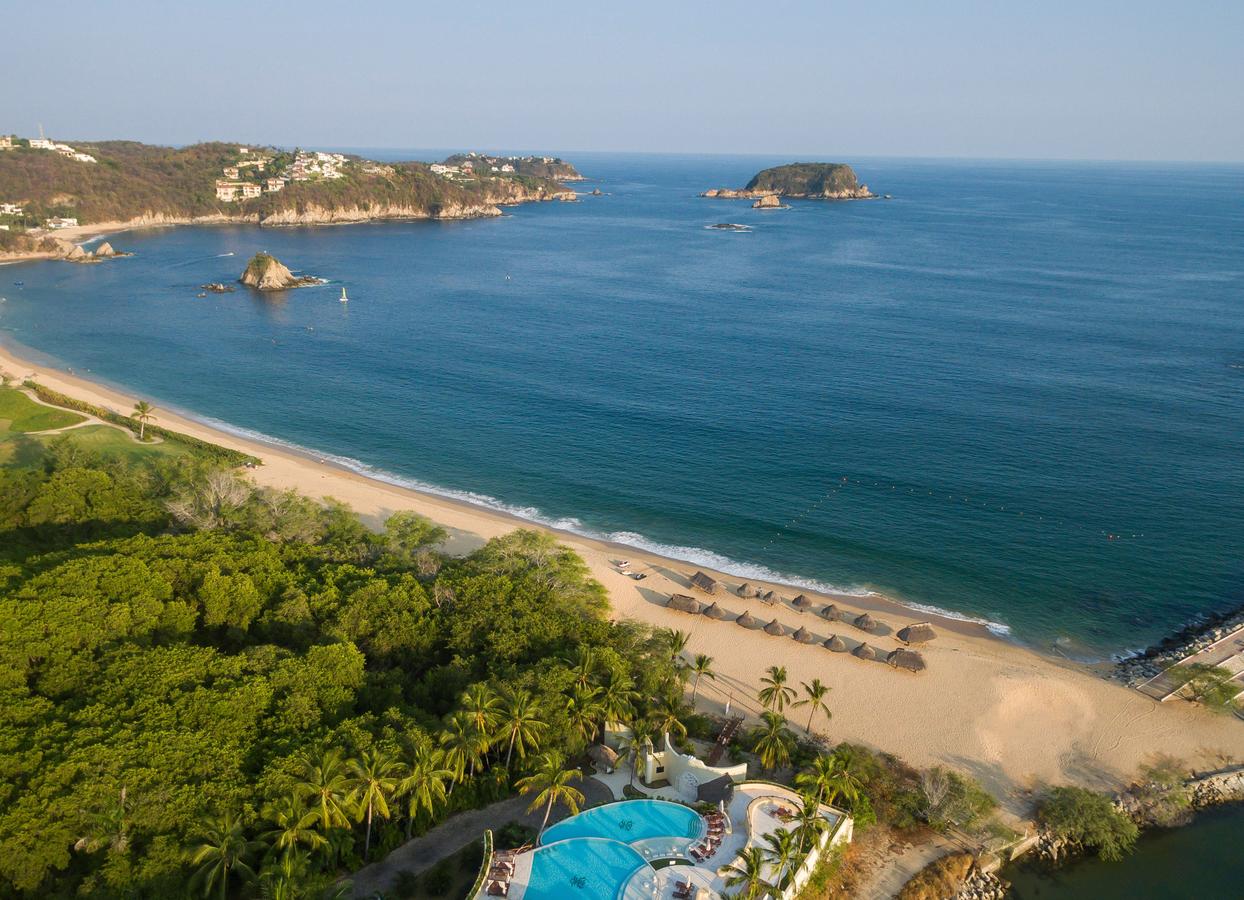 Quinta Real Huatulco boutique luxury hotel with Mexican hacienda architecture, intimate pools, and bay views in Tangolunda Bay.