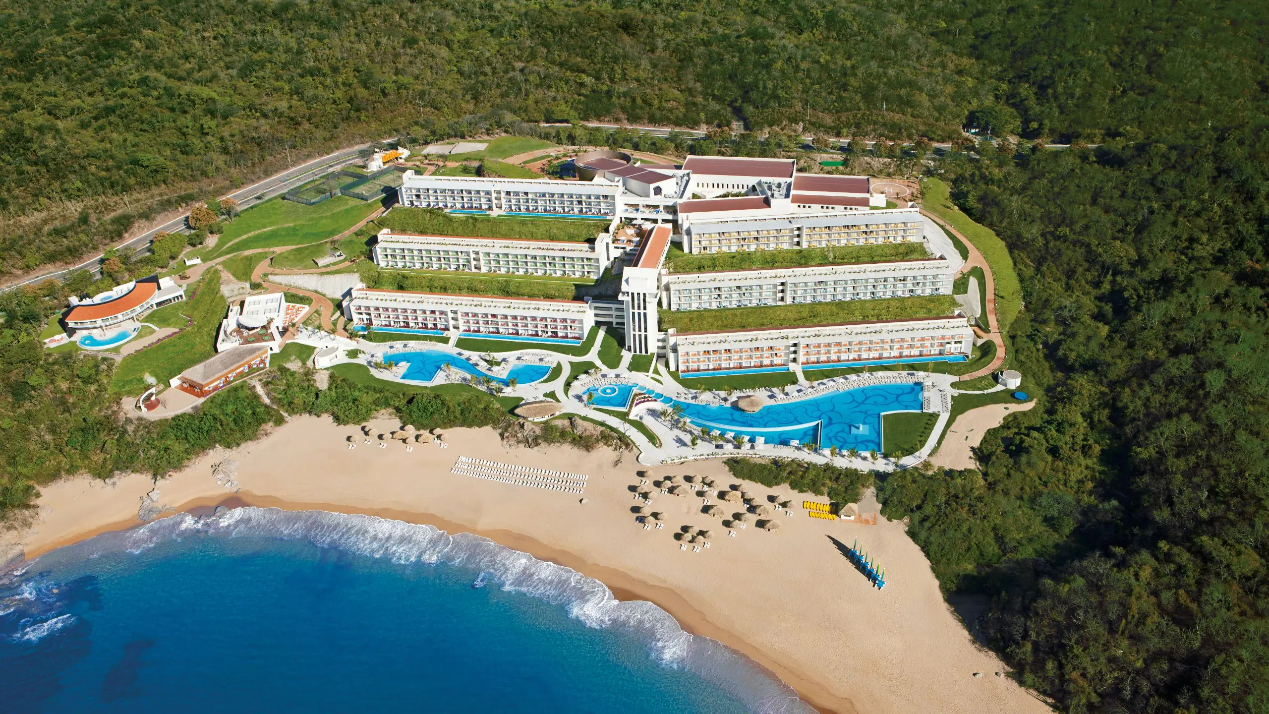 Secrets Huatulco Resort & Spa adults-only all-inclusive resort with infinity pools, romantic suites, and Pacific Ocean views in Oaxaca, Mexico.